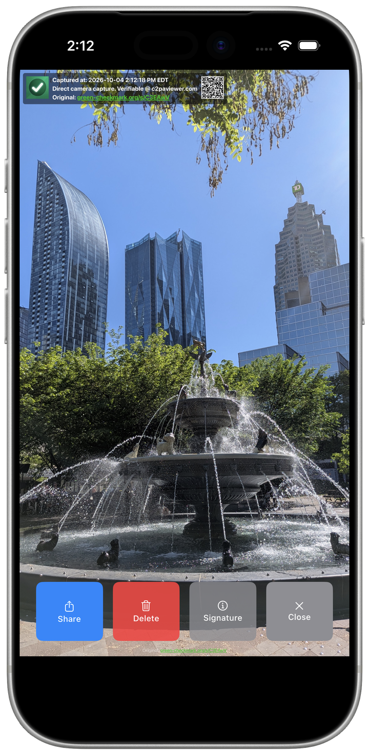 iPhone 17 Pro showing a signed photo with a GreenCheckmark banner, capture time, and QR code